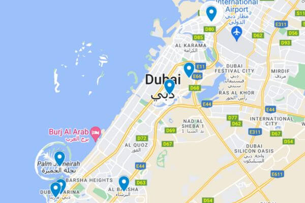 Best areas to stay in Dubai-map Map of Dubai showing recommended areas to stay including Palm Jumeirah, Dubai Marina, Burj Al Arab area, and central Dubai with blue location pins.