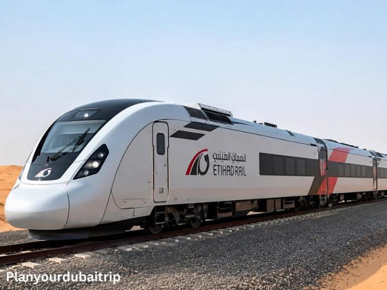 An Etihad Rail train travelling through the desert in the UAE.